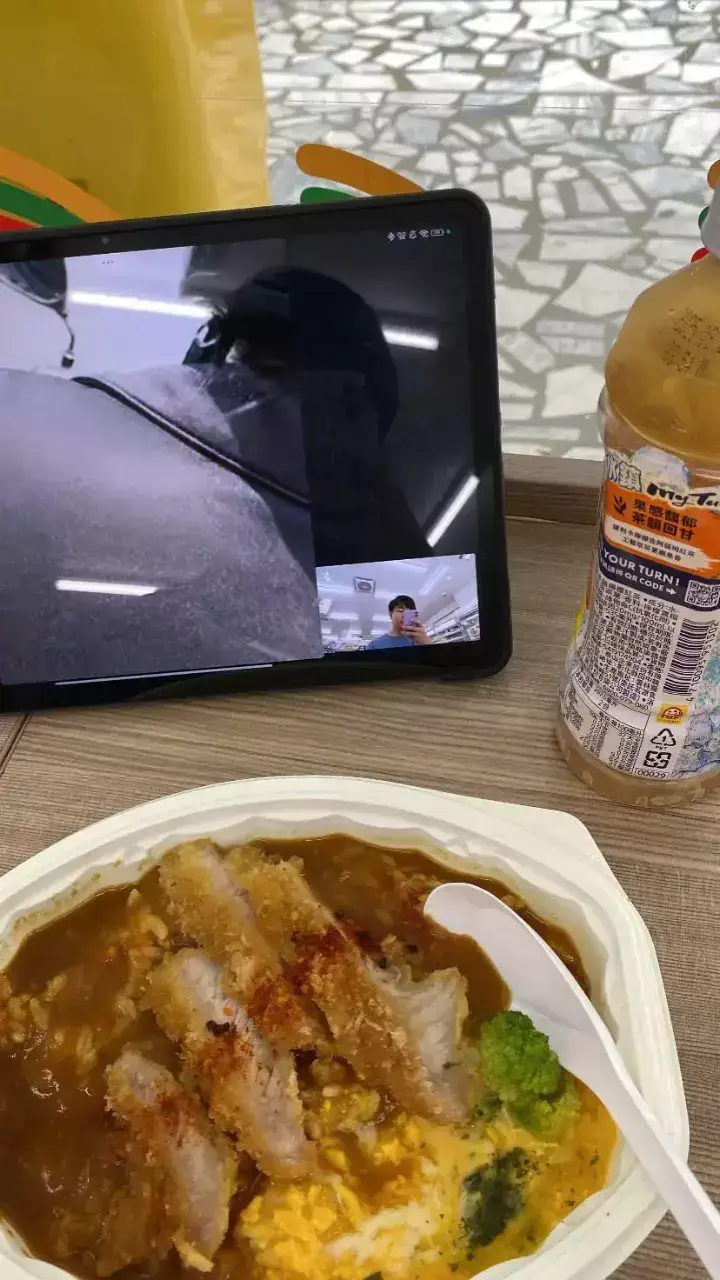 A meal after school with a video call on a tablet